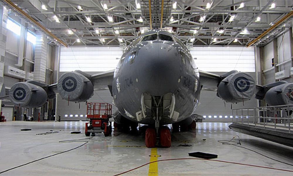 Military plane in hangar