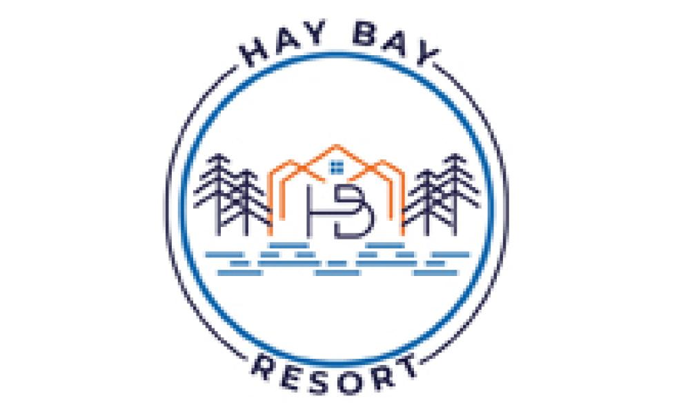 Hay Bay Resort logo is a circle outline with stick drawing in the middle of a resort in the trees on the water.